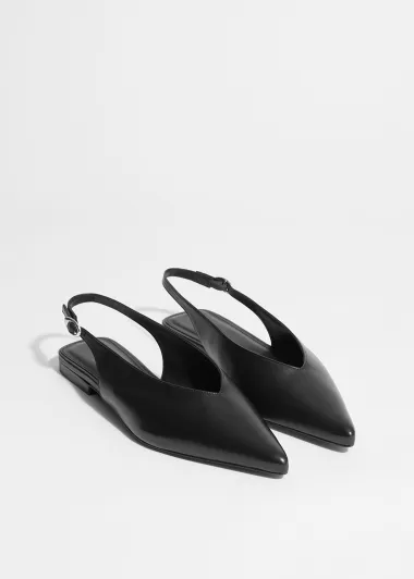 Ravne slingback cipele su hit sezone – evo kako ih nosi Dakota Johnson