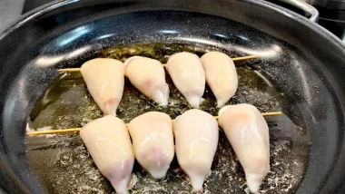 Recept za punjene lignje s pršutom i sirom za ljubitelje ribe i mesa