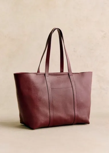 Začinit će svaki look: Torbe u crvenoj i bordo boji podižu crne i sive outfite